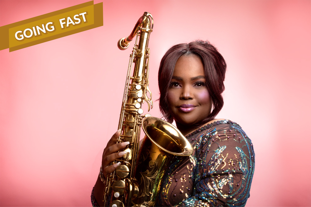 Camille Thurman holding a gold tenor saxophone in a sequined dress against a pink backdrop